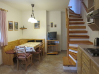 Living room with kitchen corner
